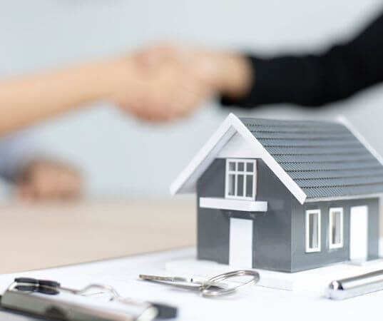 a model of a house with keys on a table the new IRS windfall