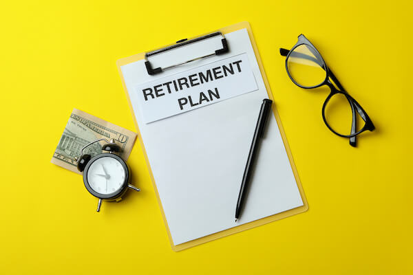 a notebook, glasses and watch changes to your retirement plan